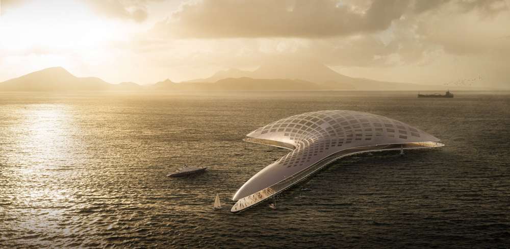 Visualisierung, Blick über das Meer vor dem Kap Agulhas. Der schwimmende Baukörper richtet sich nach den günstigsten Wellenbedingungen aus; die Indach-Photovoltaik überzieht die gekrümmte Hülle, darunter Wohnen, Bildung, Forschung und Technik.